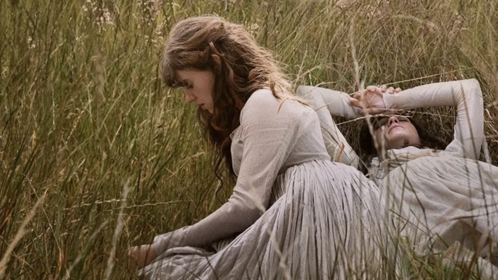 Elinor and Marianne Dashwood standing in a field in Sense & Sensibility (2026)