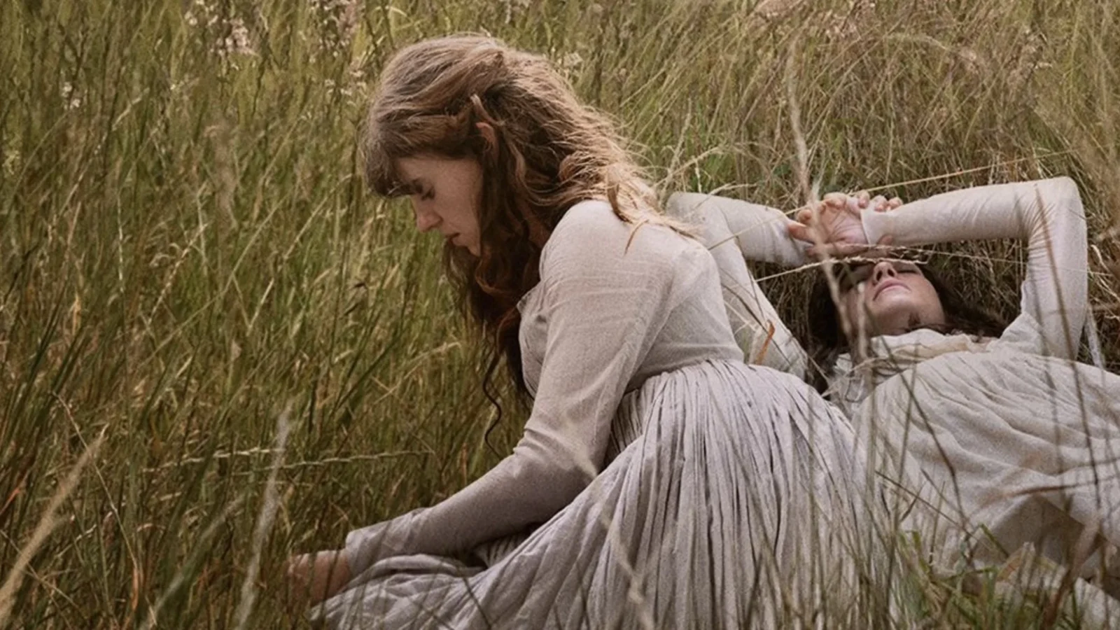 Elinor and Marianne Dashwood standing in a field in Sense & Sensibility (2026)